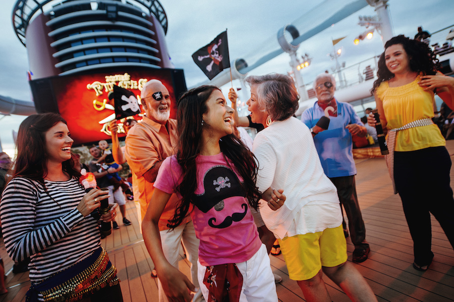 Families dancing during a deck party