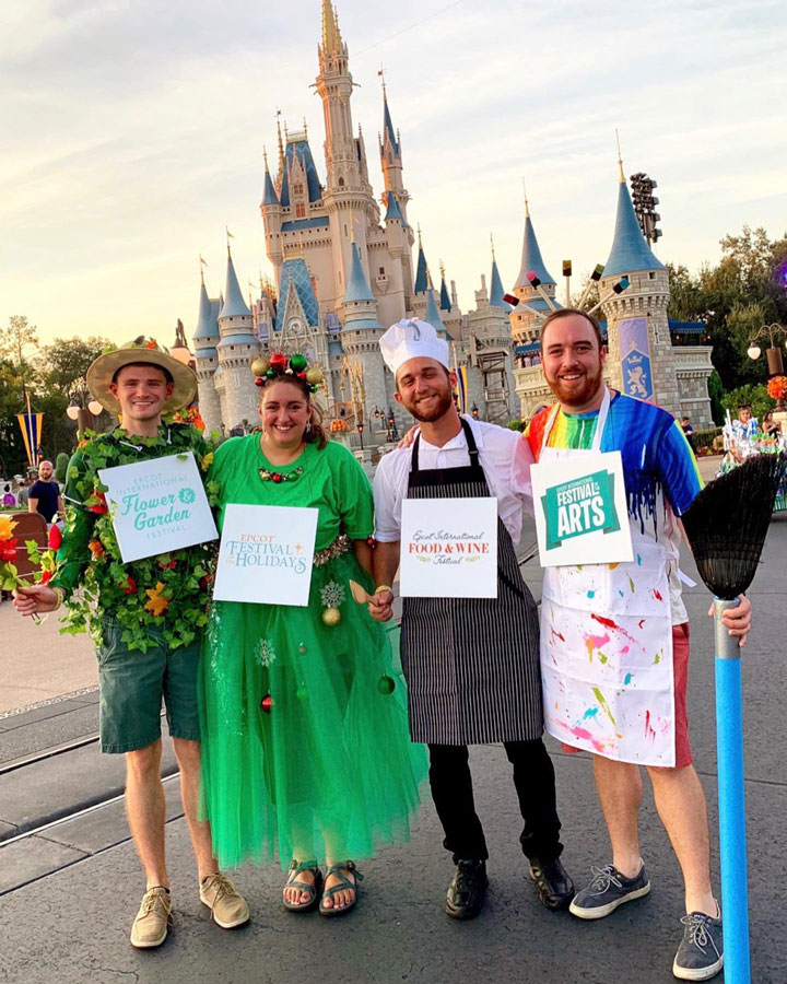 Group wearing costumes representing Epcot International Flower & Garden Festival, Epcot Festival of the Holidays, Epcot International Food & Wine Festival and Epcot International Festival of the Arts