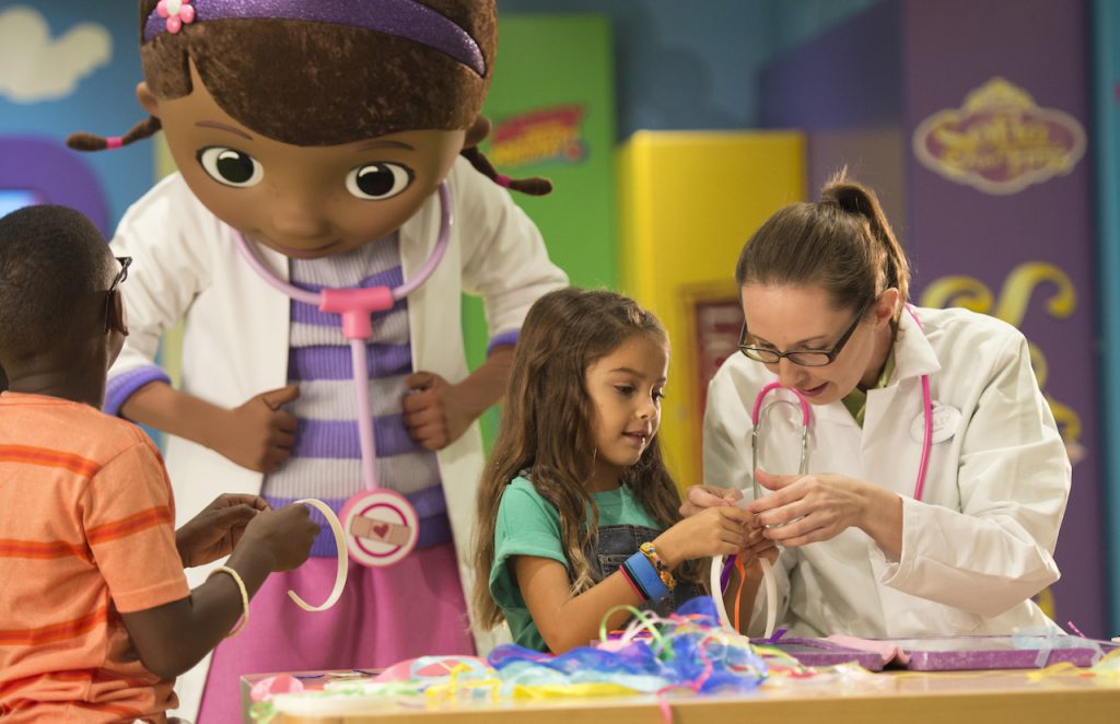 Doc McStuffins with guests on Disney Cruise Line