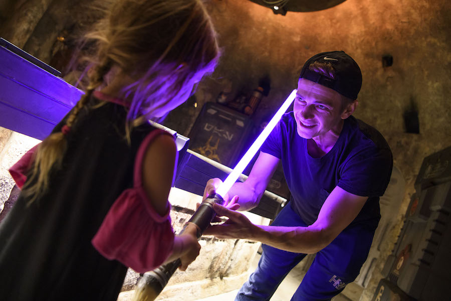 Actor Hayden Christensen shares a moment with his daughter, on her birthday, after building a custom lightsaber in Savi’s Workshop