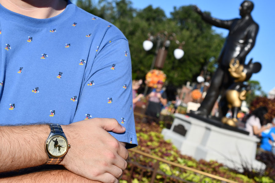 Citizen Watch featuring the Partners statue modeled in front of the Partners statue