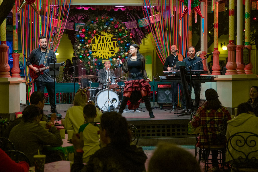 The Tina Aldana Band performs at the Diz Planet Holiday 2019 Meet-Up