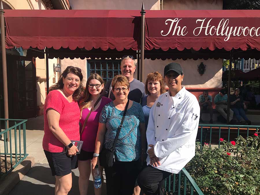 Carey Wallace and her family with Chef Bea