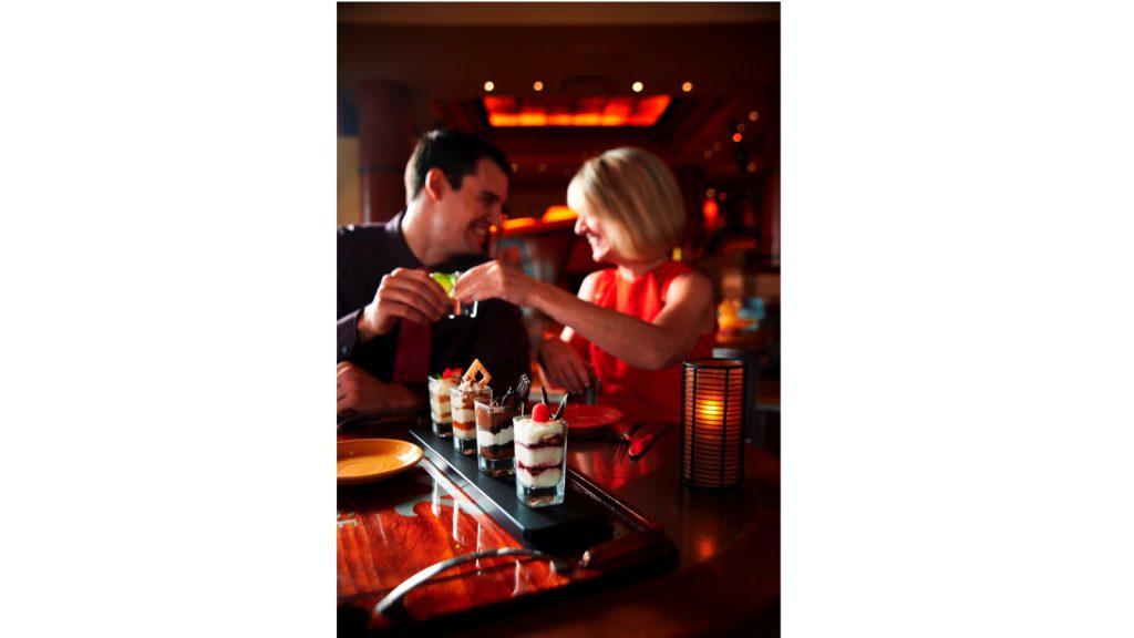 Couple eating at Maya Grill at Disney’s Coronado Springs Resort