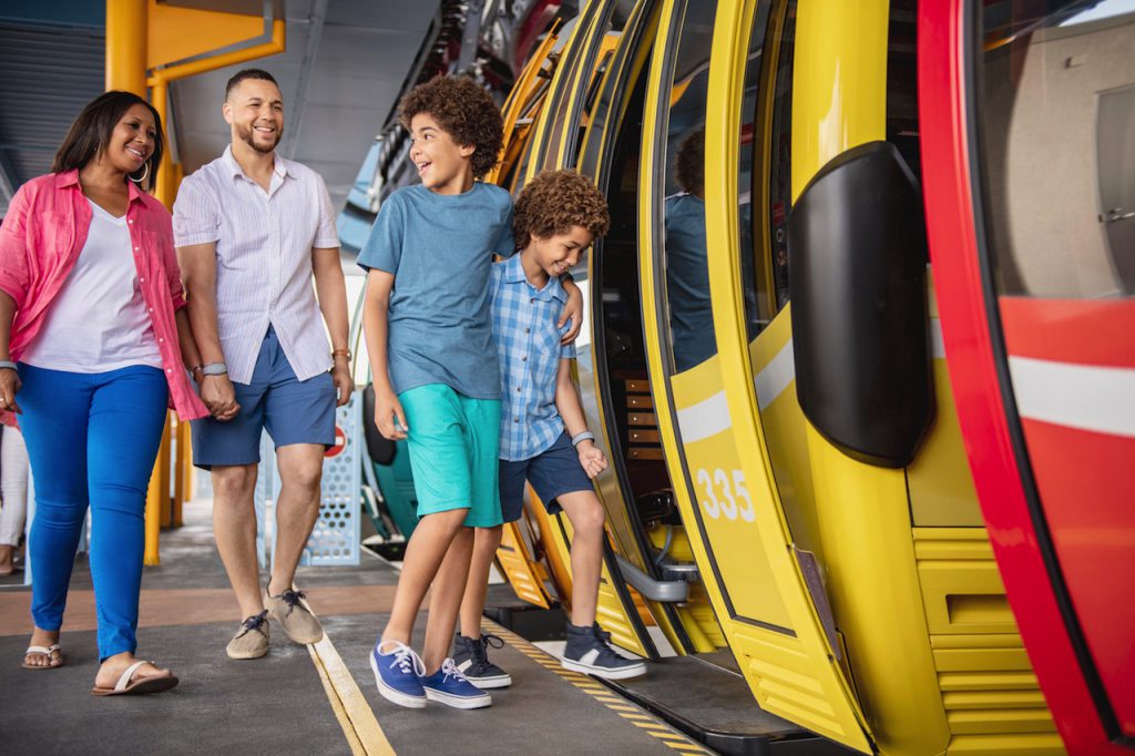 Family getting on Disney Skyliner