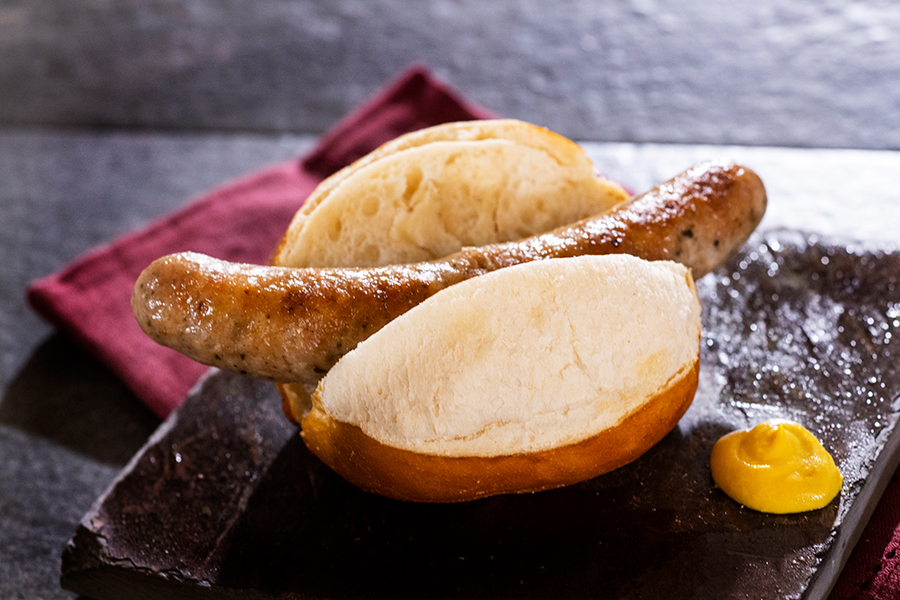 Offerings from Germany Marketplace for the 2020 Epcot Taste of International Food & Wine Festival - Roast Bratwurst in a Prop & Peller® Pretzel Roll 