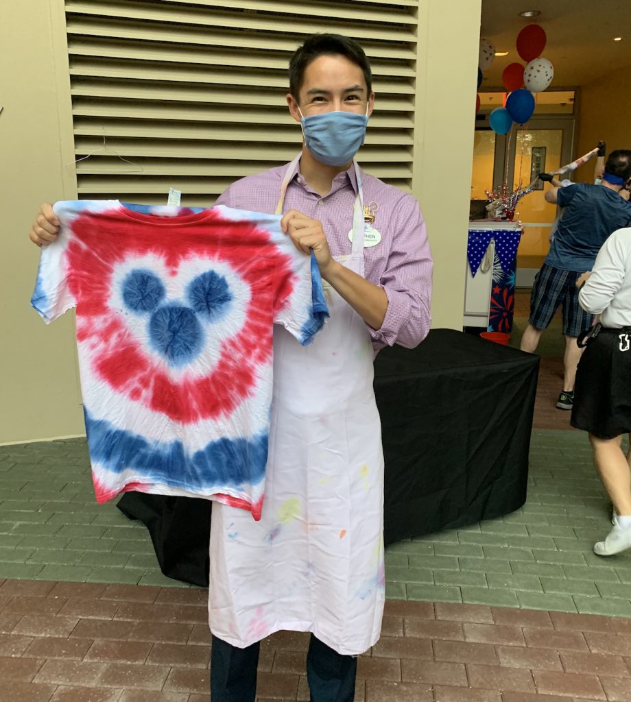  Walt Disney World Ambassador Steven with a tie-dye Mickey shirt