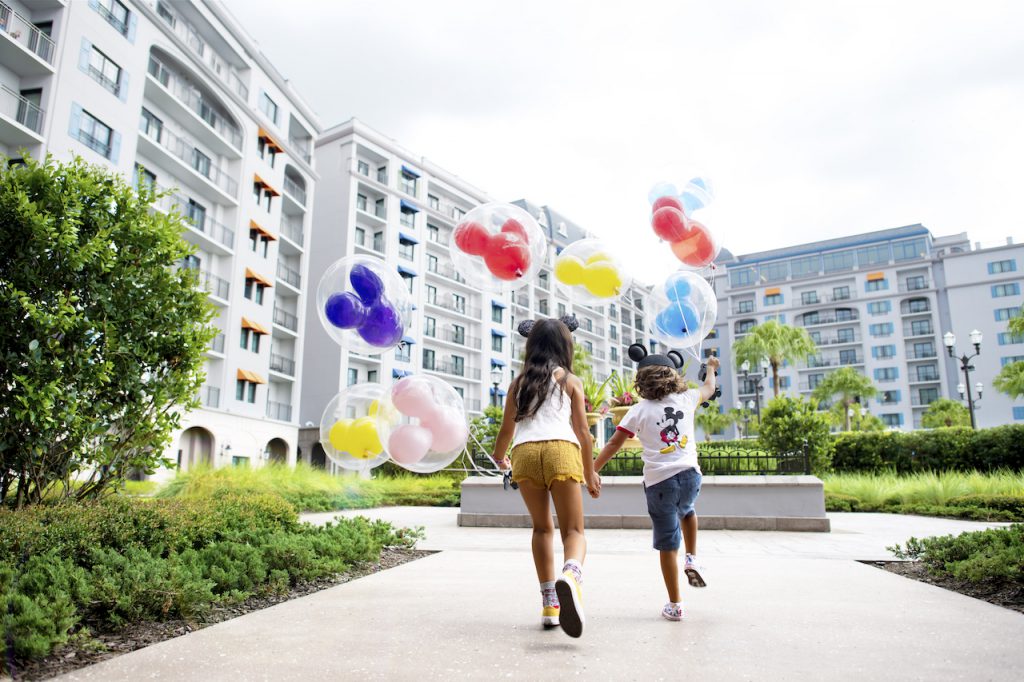 Kids with balloons at Disney's Riviera Resort