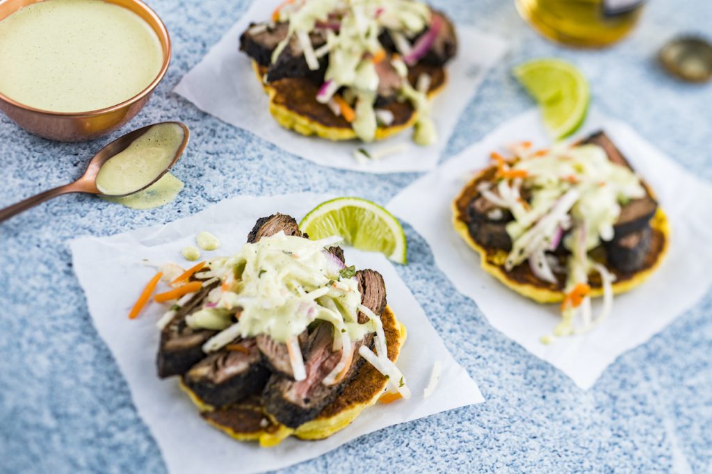 Charred skirt steak with arepa (corn cake) and jicama slaw from EPCOT