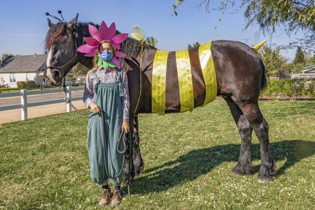 Gracie, a Percheron Draft Horse, and cast member Hanna Richter