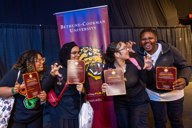 Attendees pose together at the HBCU Week Foundation College Fair