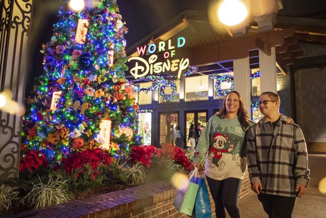 Guests shop for the holidays at World of Disney at Disney Springs