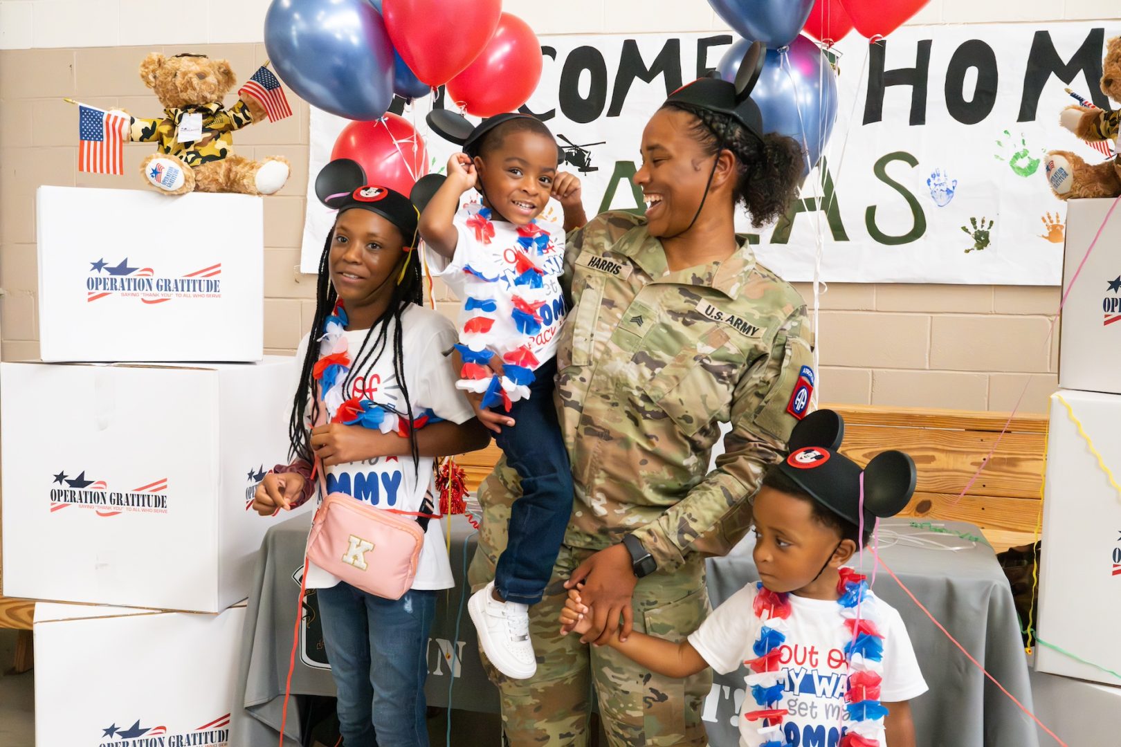 Sgt. Harris and her three children celebrating her homecoming at Ft. Liberty, North Carolina June 23, 2024, following her 6-month deployment to Southwest Asia. (Photo Credit: Operation Gratitude)